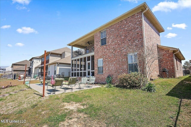 38 Savannah Cir, Brandon, MS 39047 - back of property with brick siding, a patio, a balcony, and a ceiling fan