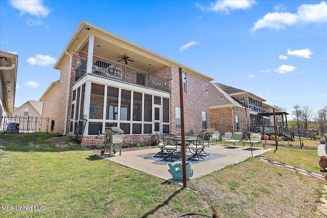 38 Savannah Cir, Brandon, MS 39047 - back of property with a balcony, brick siding, a sunroom, and a patio area