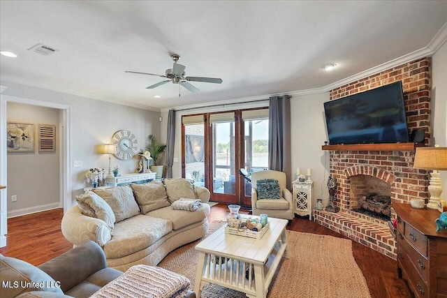 38 Savannah Cir, Brandon, MS 39047 - living area with ornamental molding, wood finished floors, ceiling fan, a fireplace, and recessed lighting
