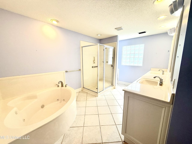 bathroom with a whirlpool tub, a sink, visible vents, and a stall shower