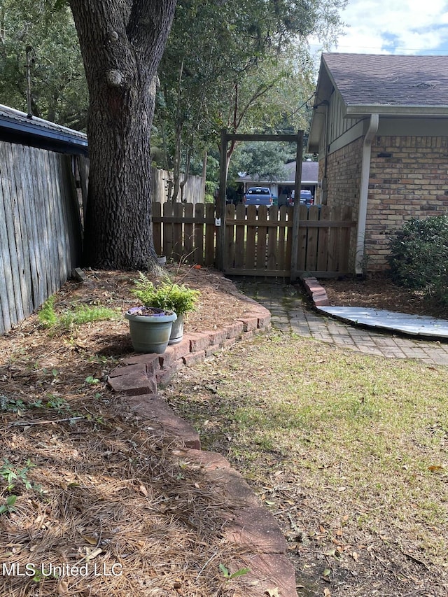 view of yard featuring fence