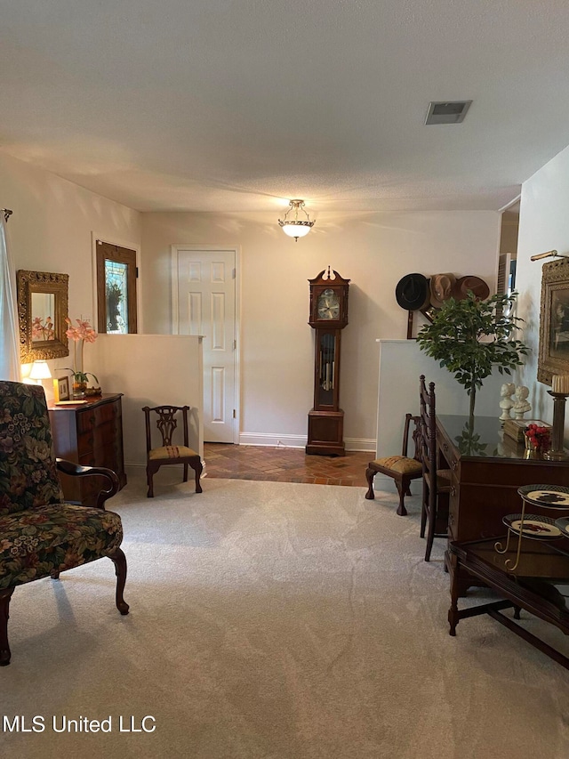 sitting room with carpet flooring