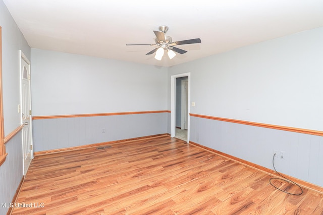206 Oak Park Dr, Pearl, MS 39208 - spare room with wood finished floors and ceiling fan