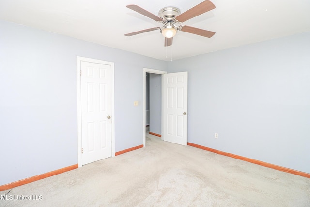 206 Oak Park Dr, Pearl, MS 39208 - unfurnished bedroom featuring carpet flooring and a ceiling fan