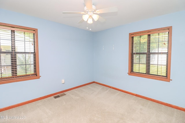 206 Oak Park Dr, Pearl, MS 39208 - unfurnished room with light colored carpet, plenty of natural light, and ceiling fan