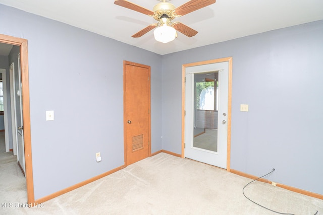 206 Oak Park Dr, Pearl, MS 39208 - spare room featuring light carpet and ceiling fan