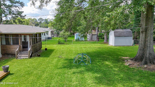 206 Oak Park Dr, Pearl, MS 39208 - fenced yard with a sunroom and a storage shed