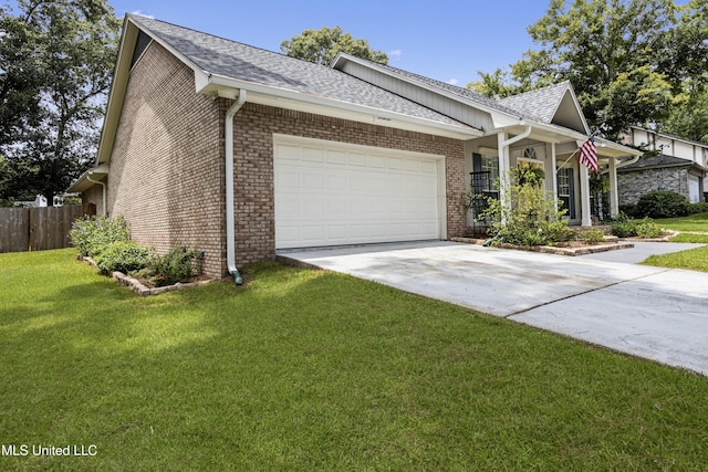 8839 Moanalua Way, Diamondhead, MS 39525 - view of front of house with concrete driveway, an attached garage, roof with shingles, and brick siding