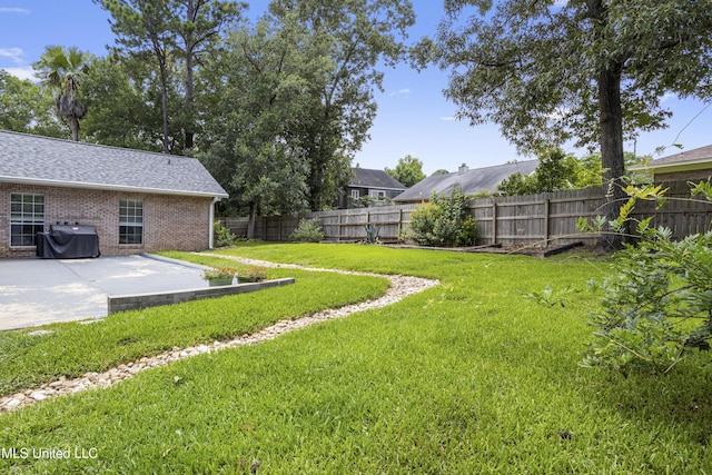 8839 Moanalua Way, Diamondhead, MS 39525 - fenced backyard featuring a patio area