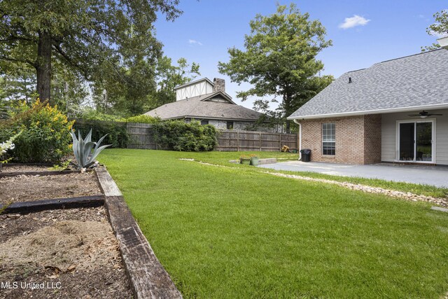 8839 Moanalua Way, Diamondhead, MS 39525 - view of yard with a patio and ceiling fan