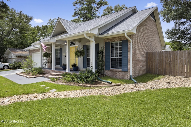 8839 Moanalua Way, Diamondhead, MS 39525 - single story home featuring brick siding, roof with shingles, a garage, and concrete driveway