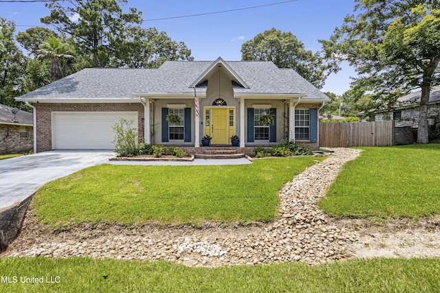 8839 Moanalua Way, Diamondhead, MS 39525 - view of front of home with a garage, driveway, and brick siding