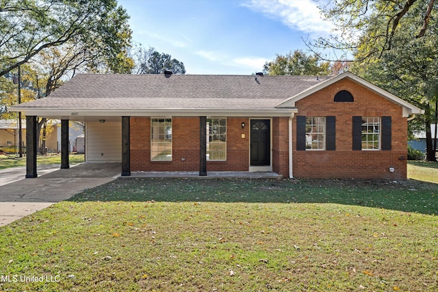 ranch-style house featuring a carport and a front lawn