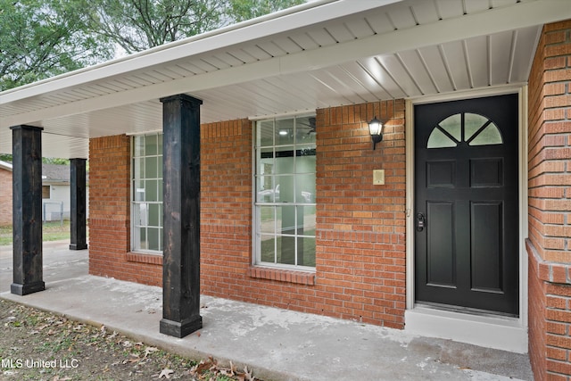 doorway to property with a porch