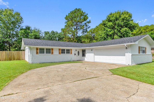 2607 Calle De Feliz St, Gautier, MS 39553 - ranch-style home featuring brick siding, a garage, a shingled roof, and concrete driveway