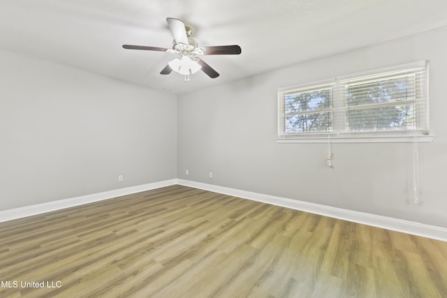 2607 Calle De Feliz St, Gautier, MS 39553 - spare room featuring wood finished floors and ceiling fan
