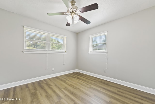 2607 Calle De Feliz St, Gautier, MS 39553 - spare room with wood finished floors and a ceiling fan
