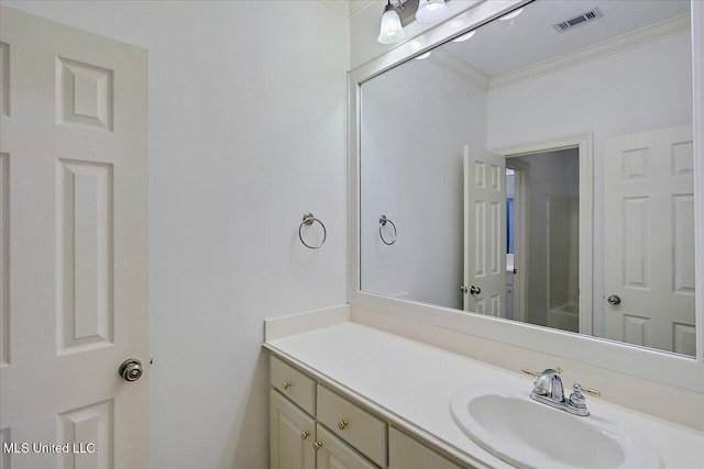 bathroom featuring vanity and ornamental molding