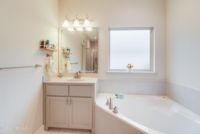 508 Dynsmore Pl, Long Beach, MS 39560 - bathroom with vanity, a bath, and a stall shower