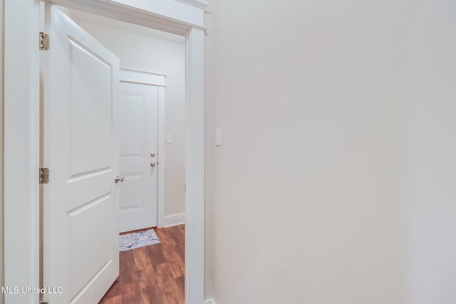 508 Dynsmore Pl, Long Beach, MS 39560 - corridor featuring dark wood finished floors and baseboards
