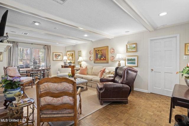 living area with a textured ceiling, recessed lighting, visible vents, baseboards, and beam ceiling