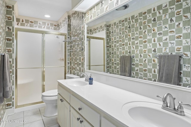 bathroom featuring a sink and a shower stall