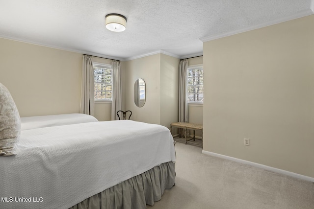 bedroom featuring ornamental molding, carpet flooring, baseboards, and multiple windows