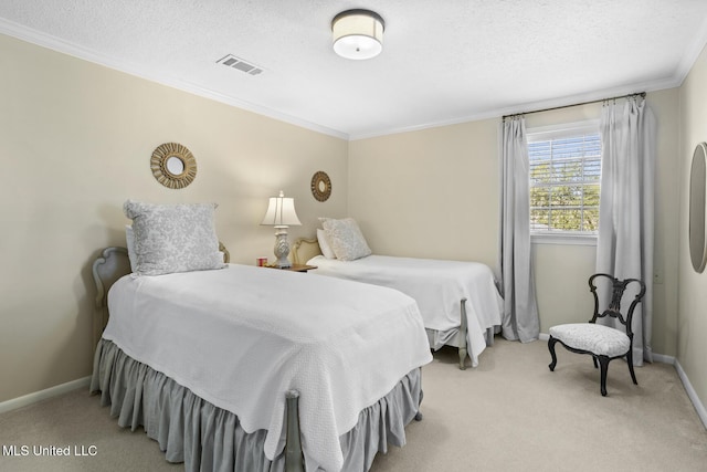 bedroom featuring carpet floors, a textured ceiling, and crown molding