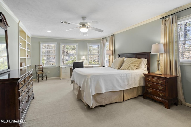 bedroom with visible vents, multiple windows, ornamental molding, and light colored carpet