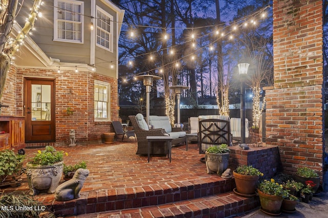 view of patio featuring fence and an outdoor hangout area