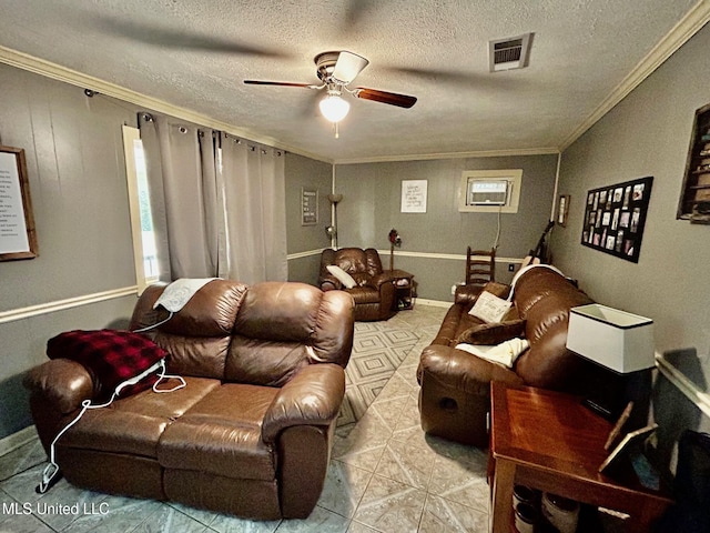 309 College St, Carthage, MS 39051 - living area featuring a textured ceiling, visible vents, a ceiling fan, and ornamental molding