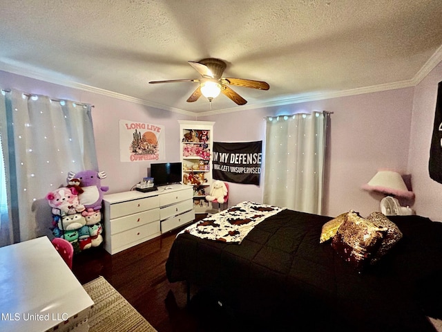 309 College St, Carthage, MS 39051 - bedroom with crown molding, a textured ceiling, wood finished floors, and ceiling fan