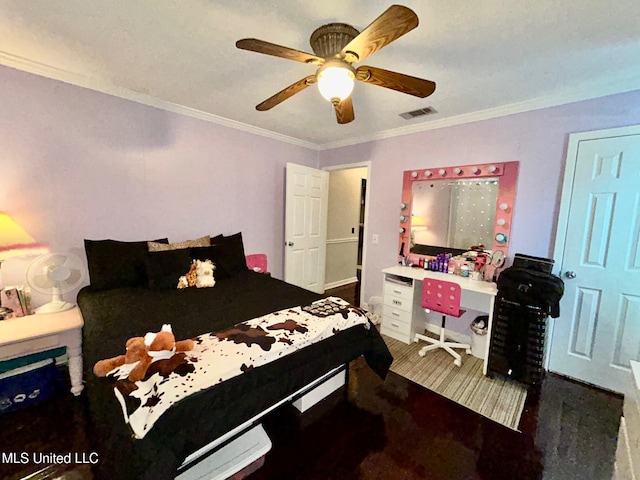 309 College St, Carthage, MS 39051 - bedroom featuring crown molding, ceiling fan, and baseboards