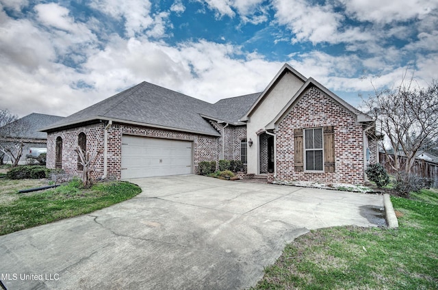 view of front of home with driveway, an attached garage, a shingled roof, and brick siding