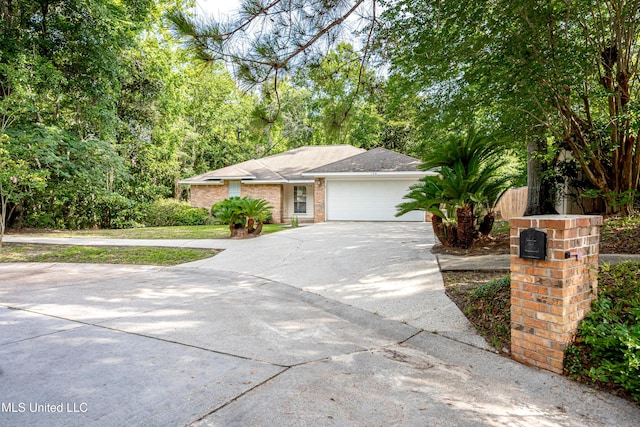 108 Water Oaks Cv, Ocean Springs, MS 39564 - view of front of house featuring concrete driveway and an attached garage