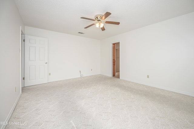 108 Water Oaks Cv, Ocean Springs, MS 39564 - empty room with ceiling fan, light carpet, a textured ceiling, and baseboards