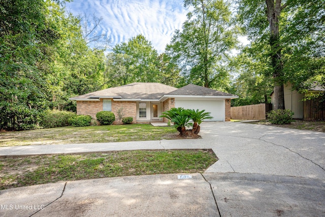108 Water Oaks Cv, Ocean Springs, MS 39564 - view of front of home featuring brick siding, concrete driveway, and an attached garage