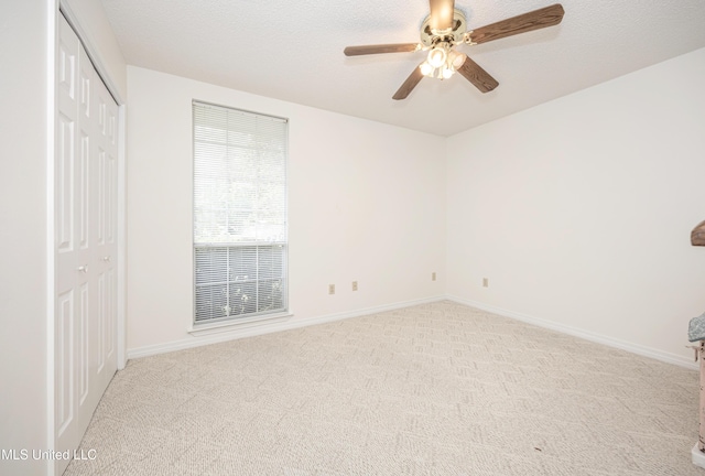 108 Water Oaks Cv, Ocean Springs, MS 39564 - unfurnished bedroom with a closet, carpet floors, baseboards, and a ceiling fan