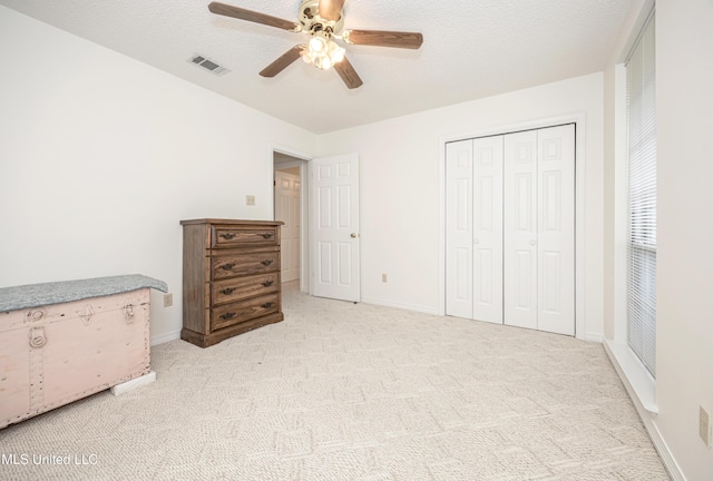 108 Water Oaks Cv, Ocean Springs, MS 39564 - carpeted bedroom with a closet, baseboards, and ceiling fan