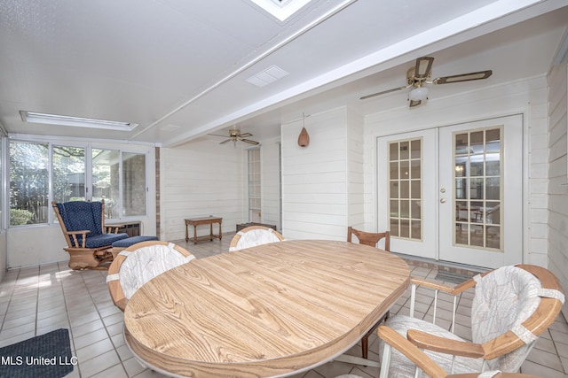 108 Water Oaks Cv, Ocean Springs, MS 39564 - sunroom / solarium with french doors, ceiling fan, outdoor dining area, and wooden walls