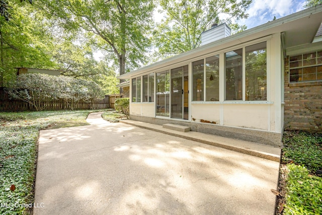 108 Water Oaks Cv, Ocean Springs, MS 39564 - view of patio / terrace with a sunroom and entry steps