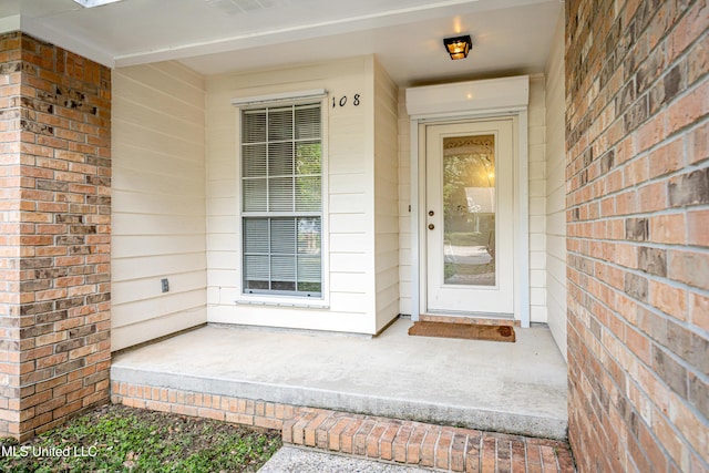 108 Water Oaks Cv, Ocean Springs, MS 39564 - property entrance featuring brick siding