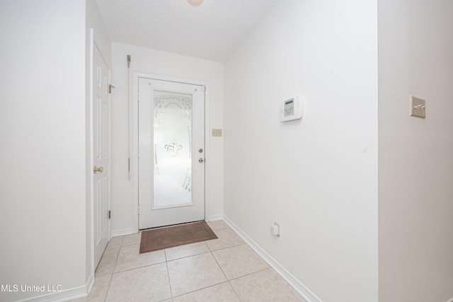 108 Water Oaks Cv, Ocean Springs, MS 39564 - doorway to outside featuring light tile patterned floors and baseboards