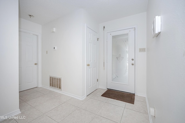 108 Water Oaks Cv, Ocean Springs, MS 39564 - entryway featuring light tile patterned floors and baseboards