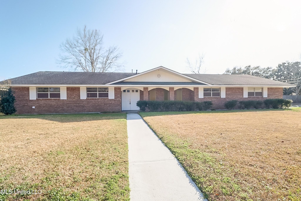 6 Pecan Cir, Long Beach, MS 39560 - ranch-style house featuring a front yard