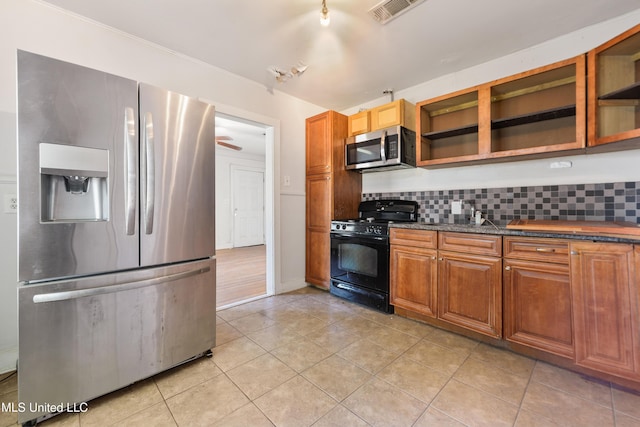 kitchen featuring visible vents, open shelves, tasteful backsplash, appliances with stainless steel finishes, and light tile patterned floors