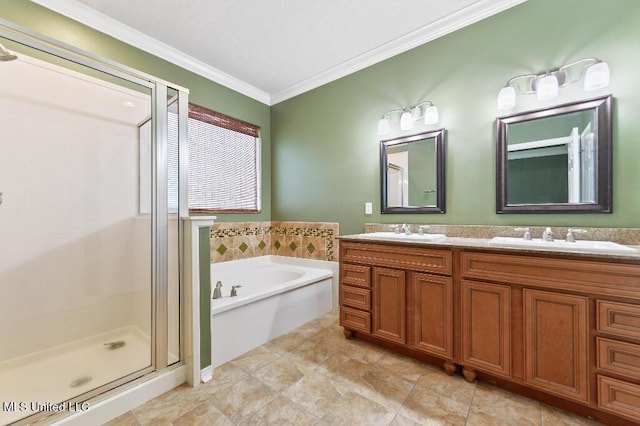 1585 Knoll Ct, Biloxi, MS 39532 - bathroom featuring double vanity, a stall shower, a garden tub, and ornamental molding