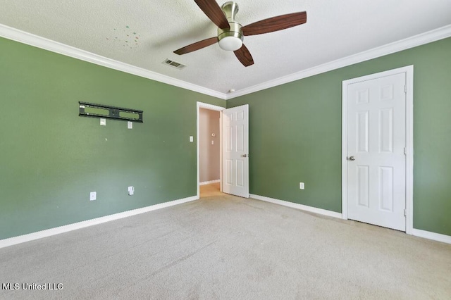 1585 Knoll Ct, Biloxi, MS 39532 - unfurnished bedroom with crown molding, baseboards, carpet floors, and ceiling fan