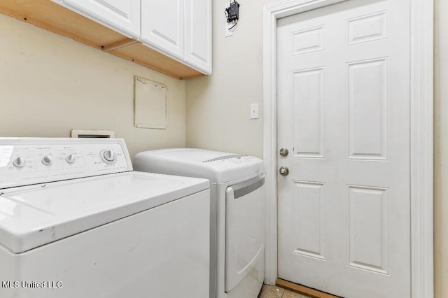 1585 Knoll Ct, Biloxi, MS 39532 - laundry area with cabinet space and washing machine and clothes dryer