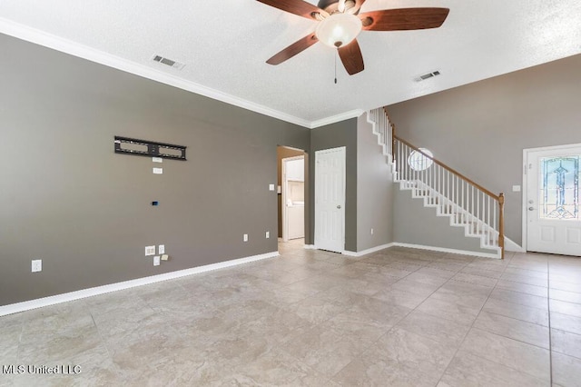 1585 Knoll Ct, Biloxi, MS 39532 - unfurnished living room with stairs, a ceiling fan, tile patterned floors, ornamental molding, and baseboards